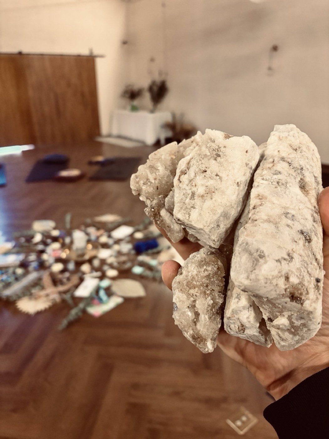 Hands holding a broken stone, close-up