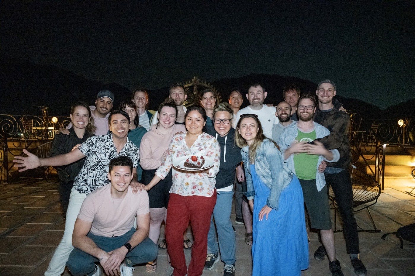 Friends grouped together at night
