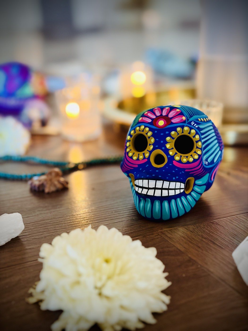 Colorful skull and flowers, close-up